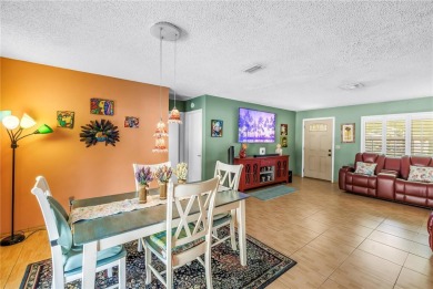 This spacious 4-bedroom, 2-bathroom pool home features a on Mangrove Bay Golf Course in Florida - for sale on GolfHomes.com, golf home, golf lot