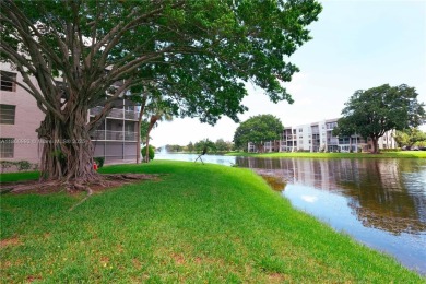 Beautiful apartment with lake front view in the lovely Pine on Pine Island Ridge Country Club in Florida - for sale on GolfHomes.com, golf home, golf lot
