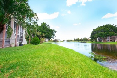 Beautiful apartment with lake front view in the lovely Pine on Pine Island Ridge Country Club in Florida - for sale on GolfHomes.com, golf home, golf lot