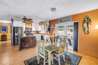 This spacious 4-bedroom, 2-bathroom pool home features a on Mangrove Bay Golf Course in Florida - for sale on GolfHomes.com, golf home, golf lot