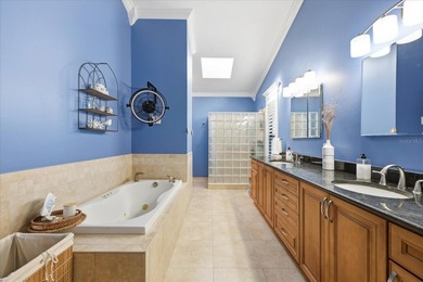 COASTAL RETREAT IN TREASURE ISLAND! Welcome to this on Treasure Bay Golf and Tennis in Florida - for sale on GolfHomes.com, golf home, golf lot