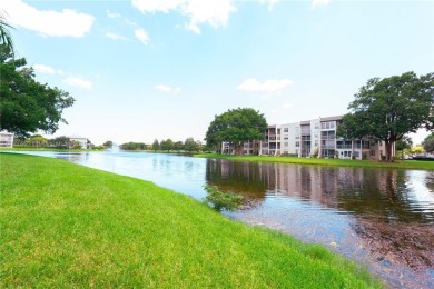 Beautiful apartment with lake front view in the lovely Pine on Pine Island Ridge Country Club in Florida - for sale on GolfHomes.com, golf home, golf lot