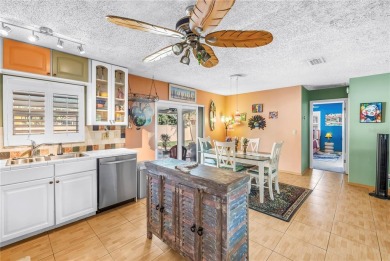 This spacious 4-bedroom, 2-bathroom pool home features a on Mangrove Bay Golf Course in Florida - for sale on GolfHomes.com, golf home, golf lot