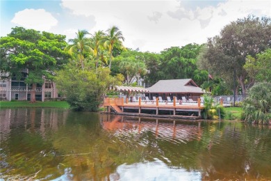 Beautiful apartment with lake front view in the lovely Pine on Pine Island Ridge Country Club in Florida - for sale on GolfHomes.com, golf home, golf lot