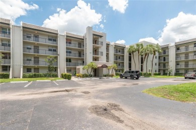 Beautiful apartment with lake front view in the lovely Pine on Pine Island Ridge Country Club in Florida - for sale on GolfHomes.com, golf home, golf lot