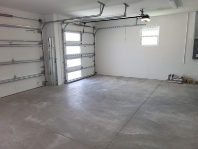 Brand new, JUST COMPLETED! 3/2/3 pool home. Easy ingress & on Pinemoor West Golf Club in Florida - for sale on GolfHomes.com, golf home, golf lot