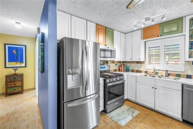 This spacious 4-bedroom, 2-bathroom pool home features a on Mangrove Bay Golf Course in Florida - for sale on GolfHomes.com, golf home, golf lot