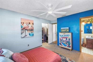 This spacious 4-bedroom, 2-bathroom pool home features a on Mangrove Bay Golf Course in Florida - for sale on GolfHomes.com, golf home, golf lot