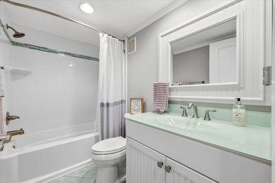 COASTAL RETREAT IN TREASURE ISLAND! Welcome to this on Treasure Bay Golf and Tennis in Florida - for sale on GolfHomes.com, golf home, golf lot