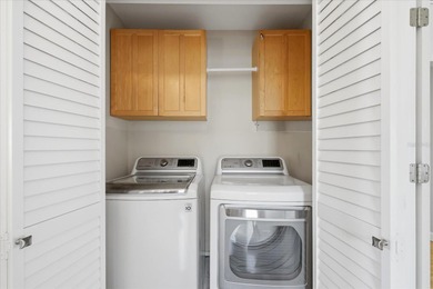 COASTAL RETREAT IN TREASURE ISLAND! Welcome to this on Treasure Bay Golf and Tennis in Florida - for sale on GolfHomes.com, golf home, golf lot