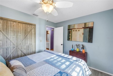 This spacious 4-bedroom, 2-bathroom pool home features a on Mangrove Bay Golf Course in Florida - for sale on GolfHomes.com, golf home, golf lot