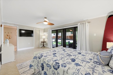 COASTAL RETREAT IN TREASURE ISLAND! Welcome to this on Treasure Bay Golf and Tennis in Florida - for sale on GolfHomes.com, golf home, golf lot