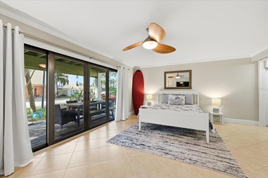 COASTAL RETREAT IN TREASURE ISLAND! Welcome to this on Treasure Bay Golf and Tennis in Florida - for sale on GolfHomes.com, golf home, golf lot