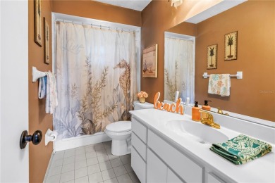This spacious 4-bedroom, 2-bathroom pool home features a on Mangrove Bay Golf Course in Florida - for sale on GolfHomes.com, golf home, golf lot