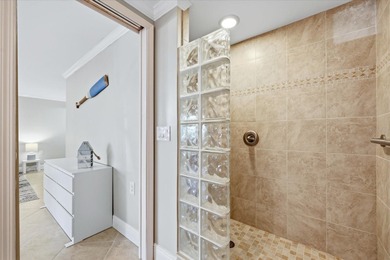 COASTAL RETREAT IN TREASURE ISLAND! Welcome to this on Treasure Bay Golf and Tennis in Florida - for sale on GolfHomes.com, golf home, golf lot