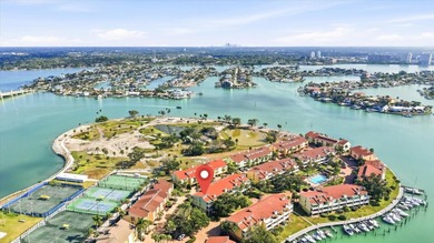 COASTAL RETREAT IN TREASURE ISLAND! Welcome to this on Treasure Bay Golf and Tennis in Florida - for sale on GolfHomes.com, golf home, golf lot