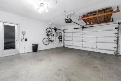 This spacious 4-bedroom, 2-bathroom pool home features a on Mangrove Bay Golf Course in Florida - for sale on GolfHomes.com, golf home, golf lot