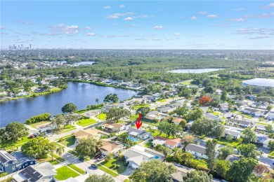 This spacious 4-bedroom, 2-bathroom pool home features a on Mangrove Bay Golf Course in Florida - for sale on GolfHomes.com, golf home, golf lot
