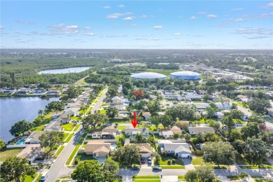 This spacious 4-bedroom, 2-bathroom pool home features a on Mangrove Bay Golf Course in Florida - for sale on GolfHomes.com, golf home, golf lot