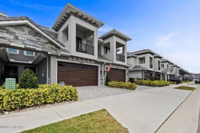 Get ready to fall in love with this exceptional townhouse in the on Venetian Bay Golf Course in Florida - for sale on GolfHomes.com, golf home, golf lot