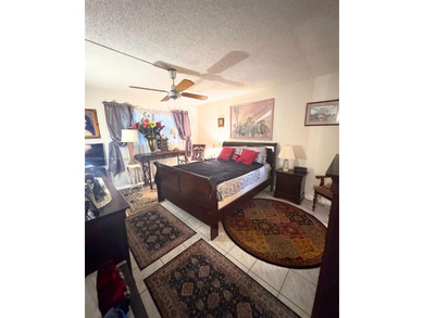 Beautifully maintained 1-bedroom, 1-bathroom condo nestled in a on Oriole Golf and Tennis Club in Florida - for sale on GolfHomes.com, golf home, golf lot