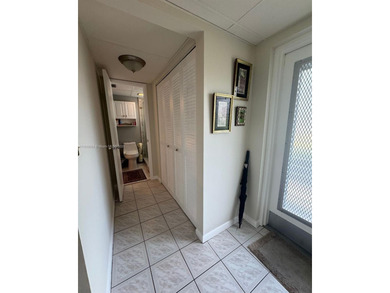 Beautifully maintained 1-bedroom, 1-bathroom condo nestled in a on Oriole Golf and Tennis Club in Florida - for sale on GolfHomes.com, golf home, golf lot