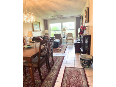 Beautifully maintained 1-bedroom, 1-bathroom condo nestled in a on Oriole Golf and Tennis Club in Florida - for sale on GolfHomes.com, golf home, golf lot