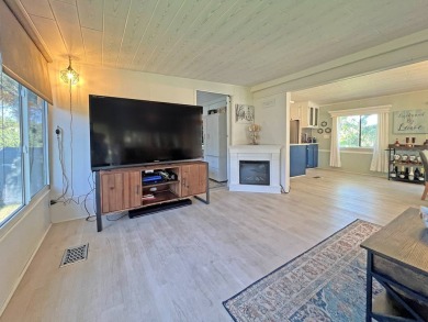 Beautifully remodeled, this 2 bedroom 2 bath park home is on The Great Outdoors Golf and Country Club in Florida - for sale on GolfHomes.com, golf home, golf lot