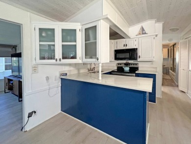 Beautifully remodeled, this 2 bedroom 2 bath park home is on The Great Outdoors Golf and Country Club in Florida - for sale on GolfHomes.com, golf home, golf lot
