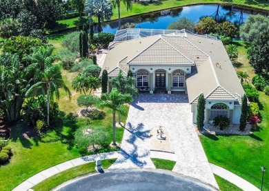 Experience the epitome of luxury living in this custom built on Baytree National Golf Links in Florida - for sale on GolfHomes.com, golf home, golf lot