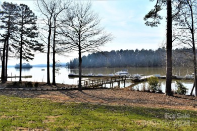 This water view Badin Lake property is located in the on Old North State Club in North Carolina - for sale on GolfHomes.com, golf home, golf lot