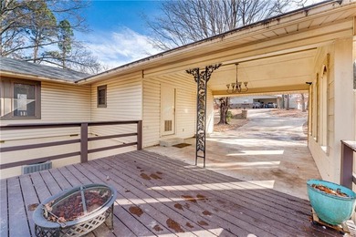Well-maintained and thoughtfully updated, this three-bedroom on Bella Vista Country Club - Berksdale in Arkansas - for sale on GolfHomes.com, golf home, golf lot