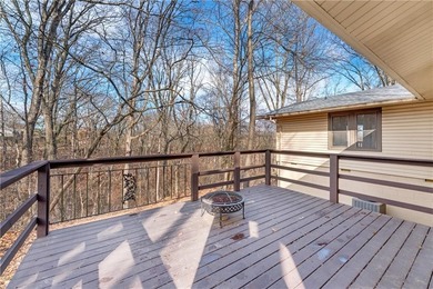 Well-maintained and thoughtfully updated, this three-bedroom on Bella Vista Country Club - Berksdale in Arkansas - for sale on GolfHomes.com, golf home, golf lot