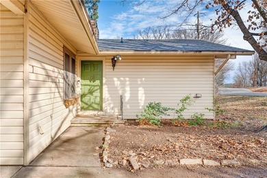 Well-maintained and thoughtfully updated, this three-bedroom on Bella Vista Country Club - Berksdale in Arkansas - for sale on GolfHomes.com, golf home, golf lot