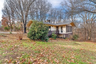 Well-maintained and thoughtfully updated, this three-bedroom on Bella Vista Country Club - Berksdale in Arkansas - for sale on GolfHomes.com, golf home, golf lot