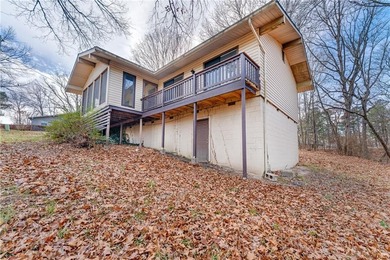 Well-maintained and thoughtfully updated, this three-bedroom on Bella Vista Country Club - Berksdale in Arkansas - for sale on GolfHomes.com, golf home, golf lot