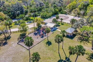 Great home among the Oaks. Wonderful two bedroom home with on Halifax Plantation Golf Club in Florida - for sale on GolfHomes.com, golf home, golf lot