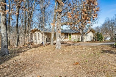 Well-maintained and thoughtfully updated, this three-bedroom on Bella Vista Country Club - Berksdale in Arkansas - for sale on GolfHomes.com, golf home, golf lot