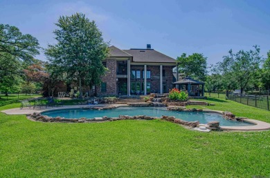 This home has it all!  Located in Prairieville in Manchac on Santa Maria Golf Club in Louisiana - for sale on GolfHomes.com, golf home, golf lot