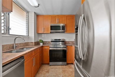 Enjoy island living with this well-situated 2BD/2BA condo on the on Honolulu Country Club in Hawaii - for sale on GolfHomes.com, golf home, golf lot