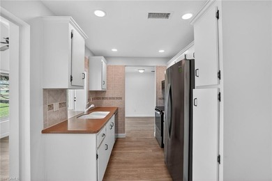 This stunningly renovated end-unit villa offers the ultimate on Quail Run Golf Club In Naples in Florida - for sale on GolfHomes.com, golf home, golf lot