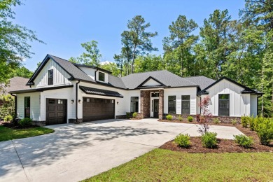 Welcome to modern farmhouse elegance in this stunning, Like New on Heron Point Golf Club in South Carolina - for sale on GolfHomes.com, golf home, golf lot
