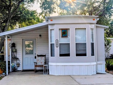 This Unit has a site built addition that includes a laundry or on Cane Garden Golf Course in Florida - for sale on GolfHomes.com, golf home, golf lot