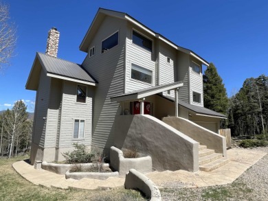 An exceptional multi-level completely furnished mountain home on Angel Fire Resort Country Club in New Mexico - for sale on GolfHomes.com, golf home, golf lot