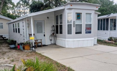 This Unit has a site built addition that includes a laundry or on Cane Garden Golf Course in Florida - for sale on GolfHomes.com, golf home, golf lot