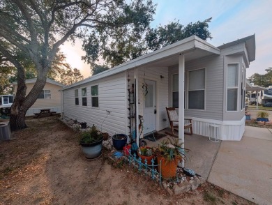 This Unit has a site built addition that includes a laundry or on Cane Garden Golf Course in Florida - for sale on GolfHomes.com, golf home, golf lot