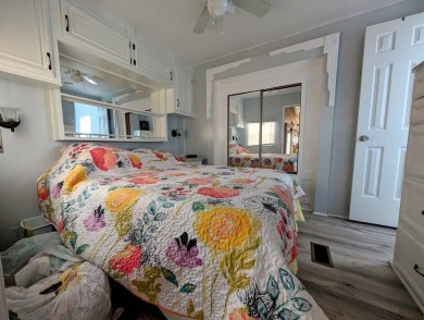This Unit has a site built addition that includes a laundry or on Cane Garden Golf Course in Florida - for sale on GolfHomes.com, golf home, golf lot