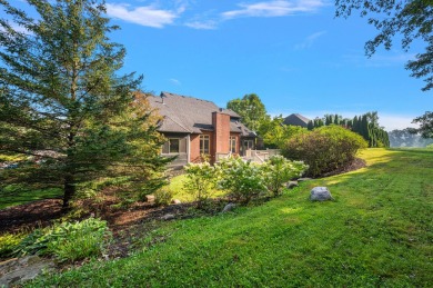 Discover unparalleled elegance in this brick colonial nestled on Beacon Hill Golf Club in Michigan - for sale on GolfHomes.com, golf home, golf lot