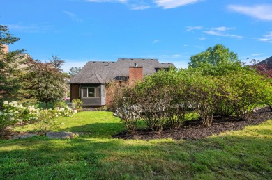Discover unparalleled elegance in this brick colonial nestled on Beacon Hill Golf Club in Michigan - for sale on GolfHomes.com, golf home, golf lot
