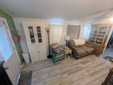 This Unit has a site built addition that includes a laundry or on Cane Garden Golf Course in Florida - for sale on GolfHomes.com, golf home, golf lot